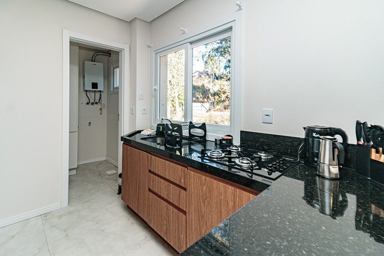 Ap 1 Dormitório com garagem ampla e churrasqueira